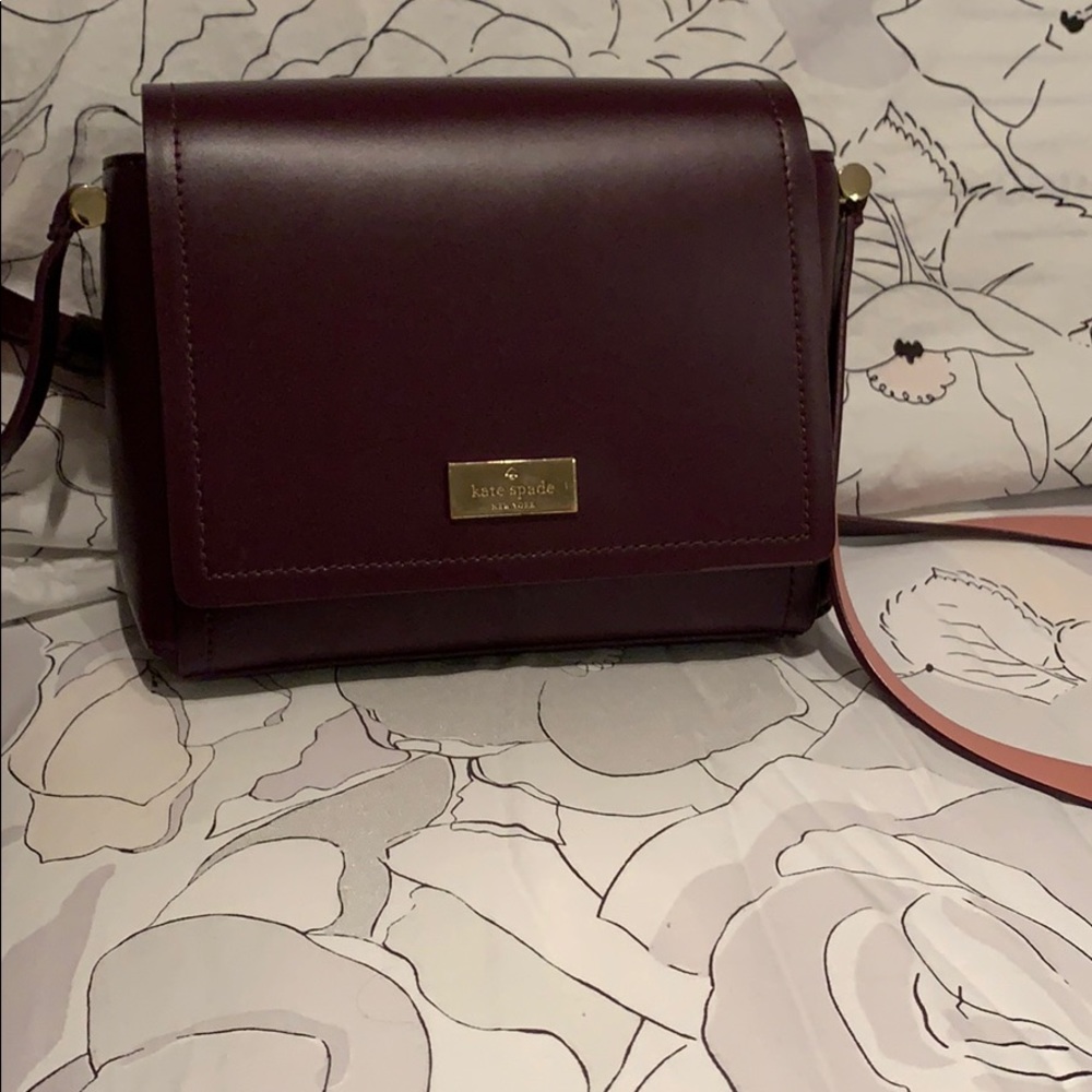 Kate Spade purse. Purple plum color.
